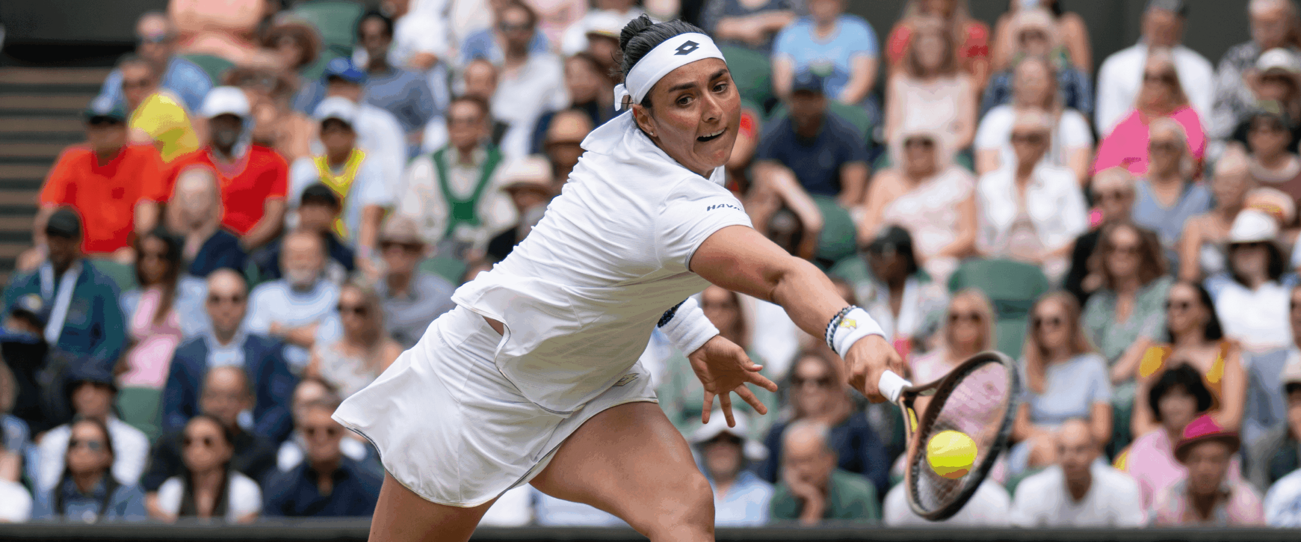 Tennis player in white serving a forehand, crowd watching intently in the background, during a match. 10 rules of tennis context included.